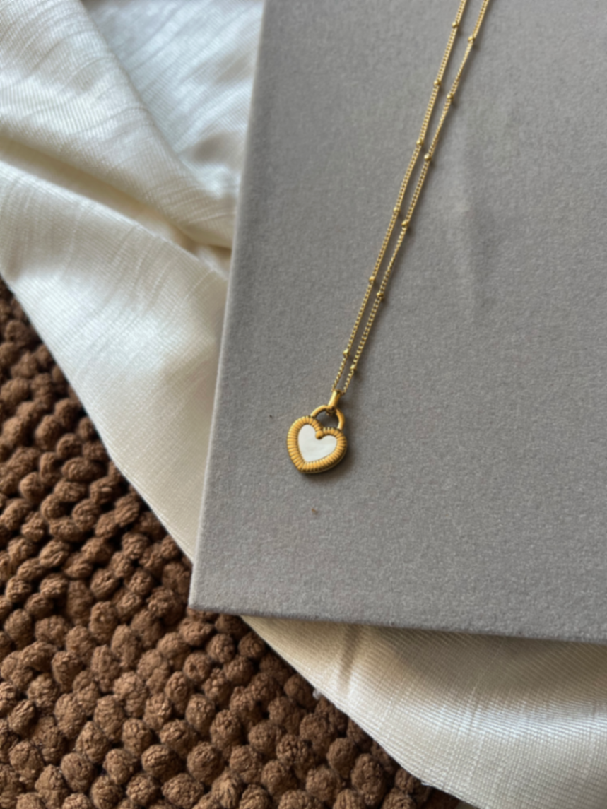 Reversible love pendant chain