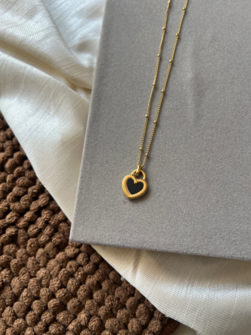 Reversible love pendant chain