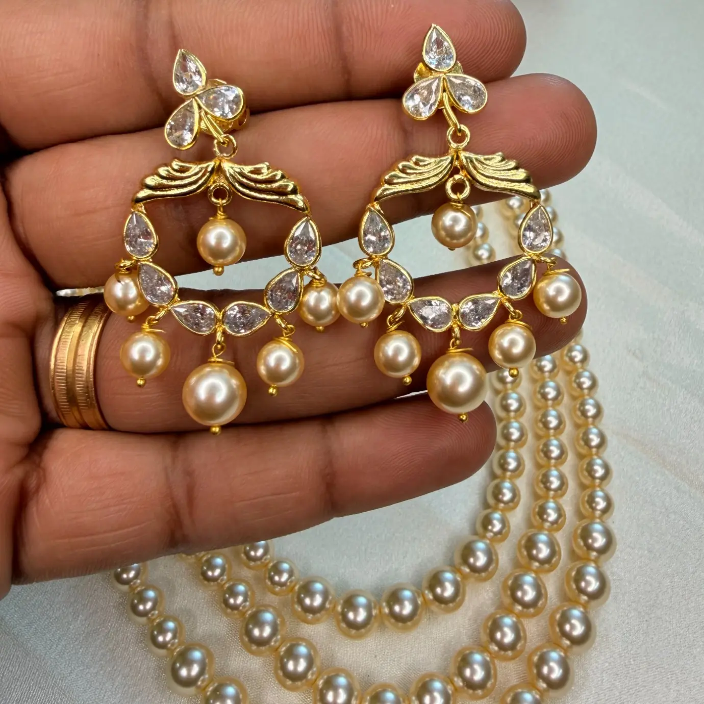 Mukta Premium Swarovski Pearl Three-Strand Layered Haaram Set with Chaandbali Earrings SJPM008