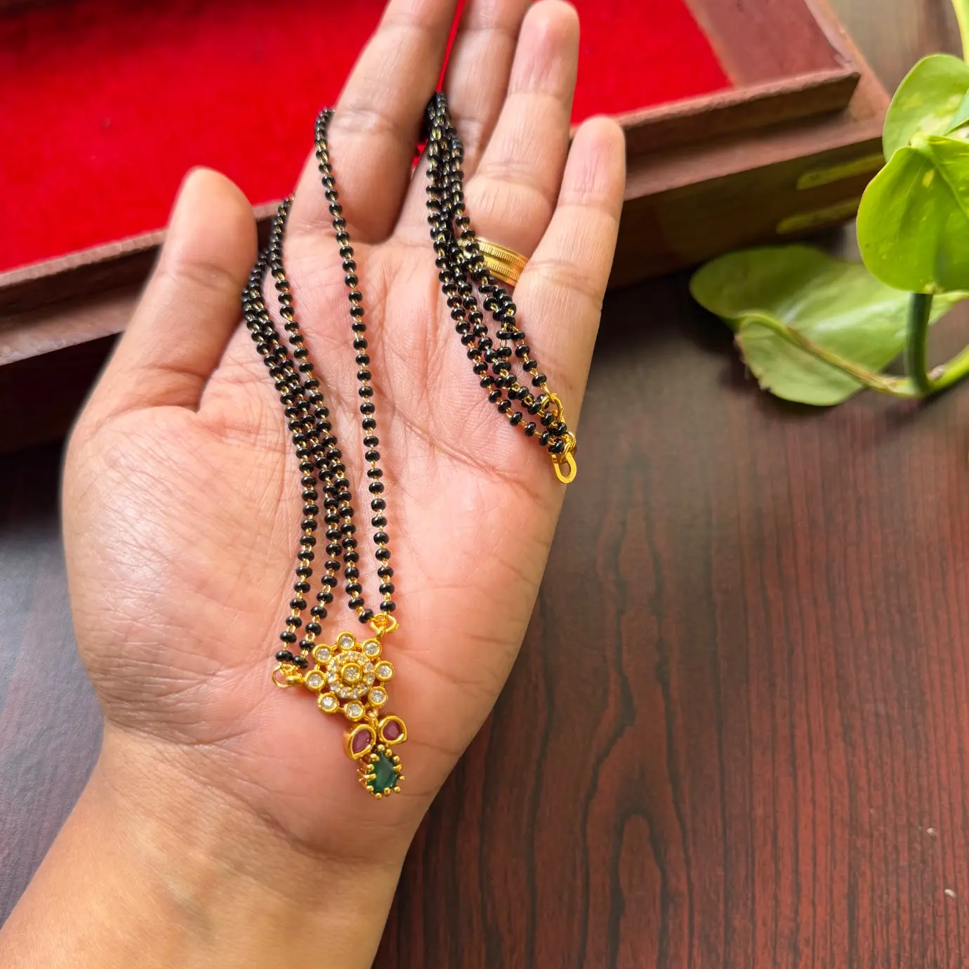 Floral CZ Floral Pendant Black Bead Mangalsutra with Ruby & Emerald Accent SJM005