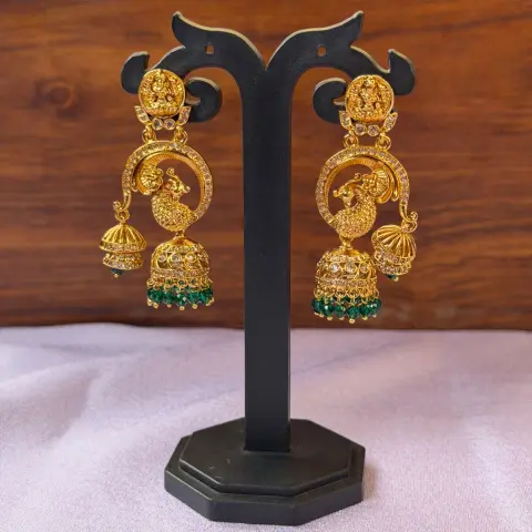 Goddess Lakshmi and Peacock Motif Gold-Plated Jhumka Earrings