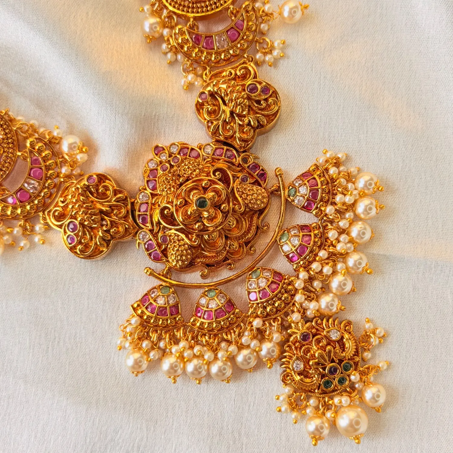 Royal Traditional Gold-Plated Multi-Strand Pearl Long Haram Necklace Set with Ruby and Emerald Accents SJPM028