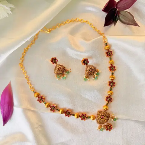 Traditional Gold-Plated Floral Temple Necklace Set with Ruby and Emerald Accents and Matching Earrings SJPM030