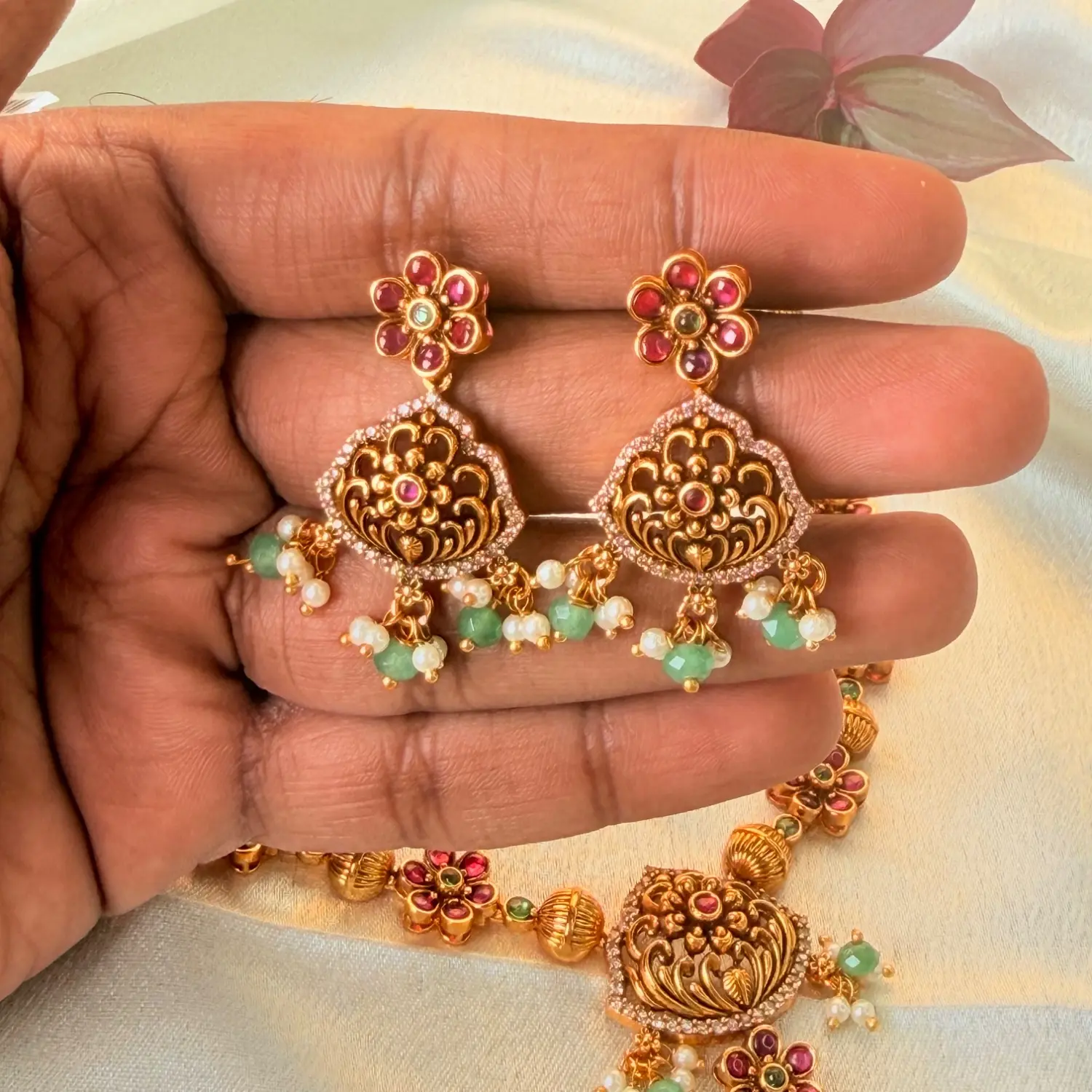 Traditional Gold-Plated Floral Temple Necklace Set with Ruby and Emerald Accents and Matching Earrings SJPM030