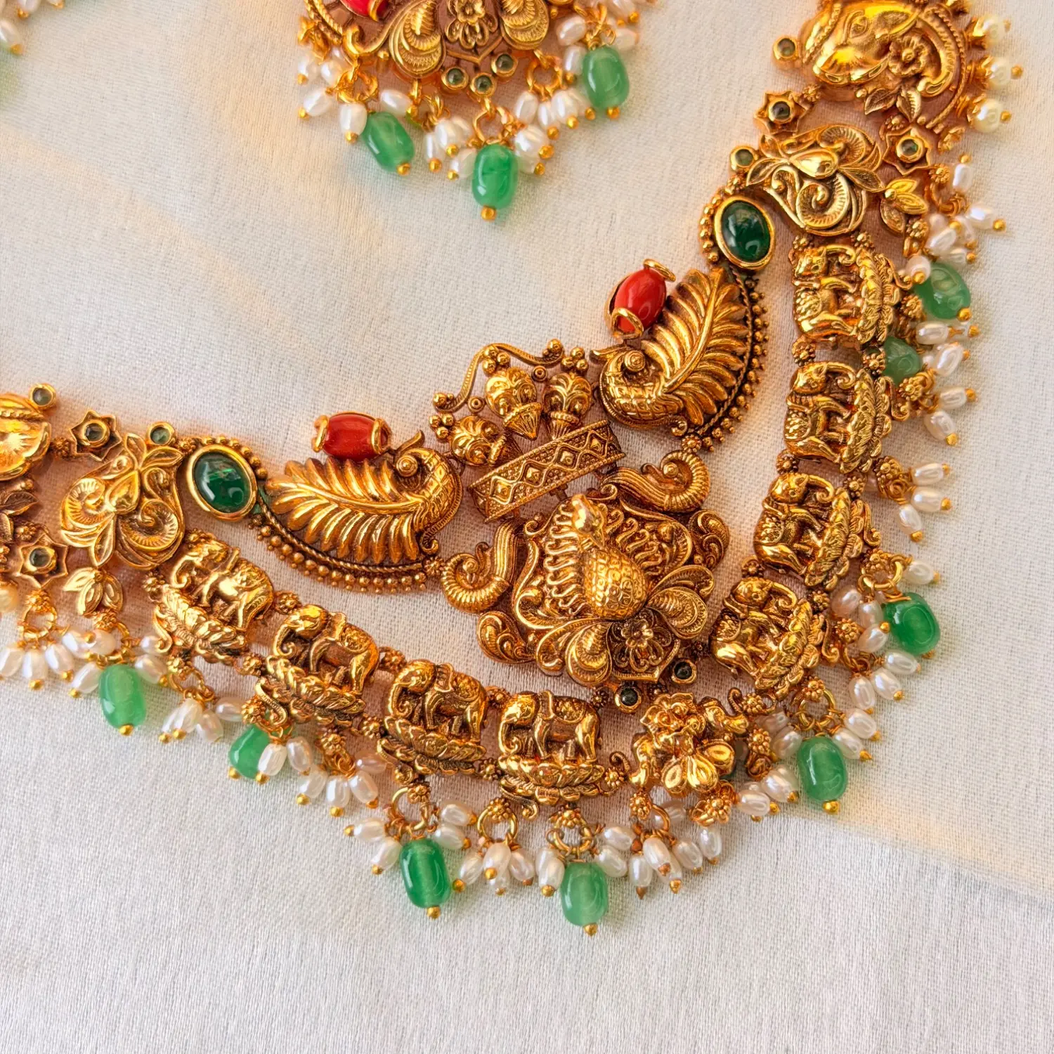 Royal Traditional Gold-Plated Temple Necklace Set with Ruby, Emerald, and Pearl Accents and Matching Earrings SJPM031