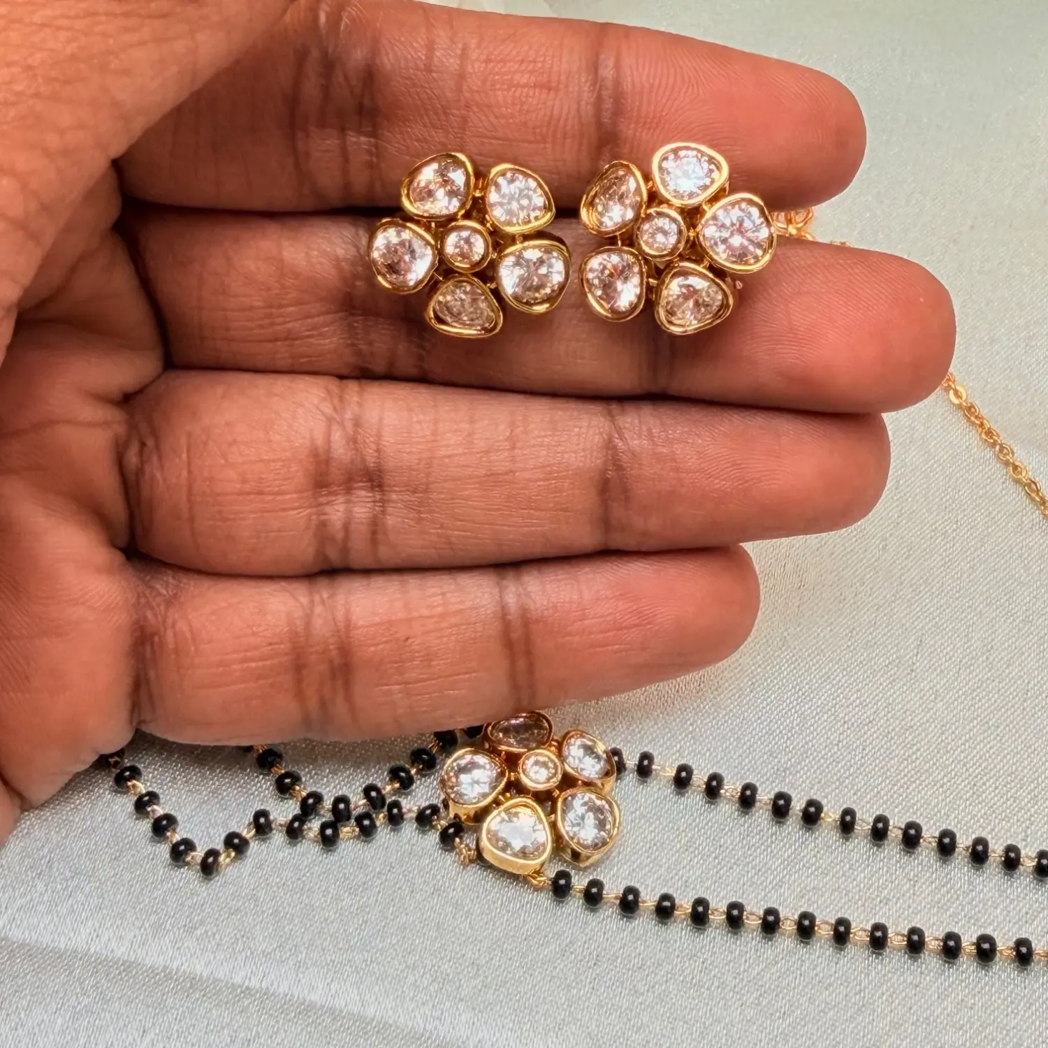 Double-Strand Black Beaded AD Stone Floral Pendant Mangalsutra Set with Earrings