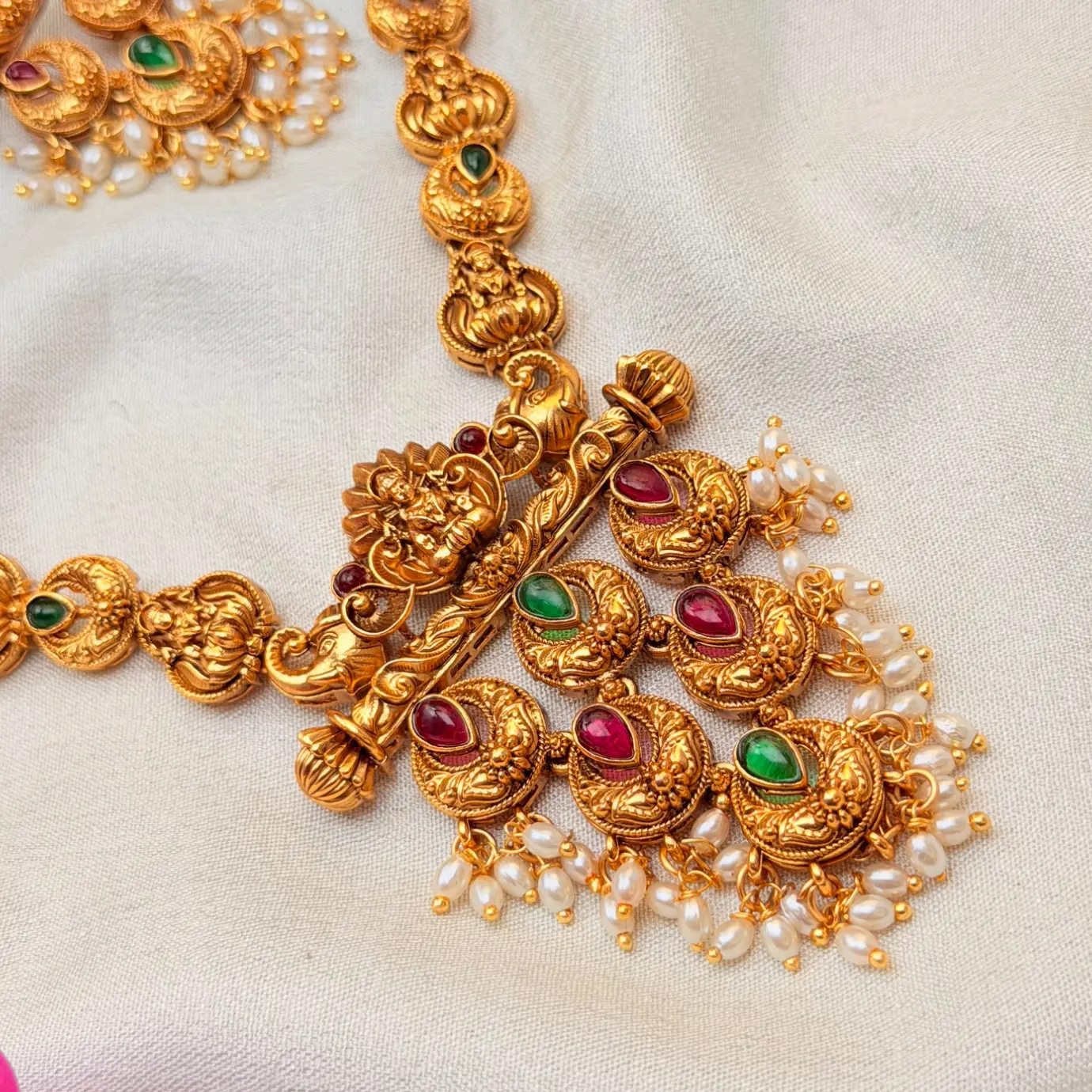 Antique Matte Gold Nakshi Goddess Lakshmi Pendant Haram with Chandbali Kemp Drops & Matching Pearl Earrings SJSN070