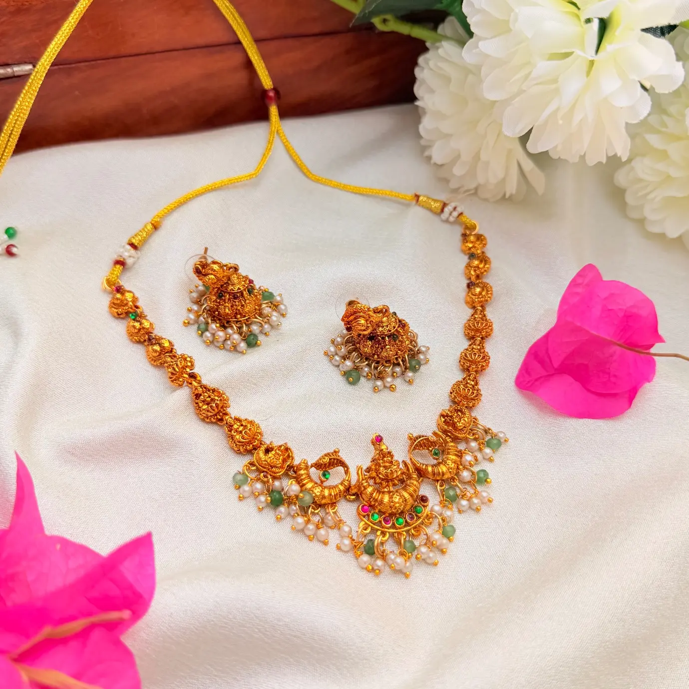 Gold Replica Antique Matte Lakshmi & Mayuri Nakshi Neckpiece with Kemp Stones, Emerald Beads & Pearl Cluster Jhumkis SJSN073