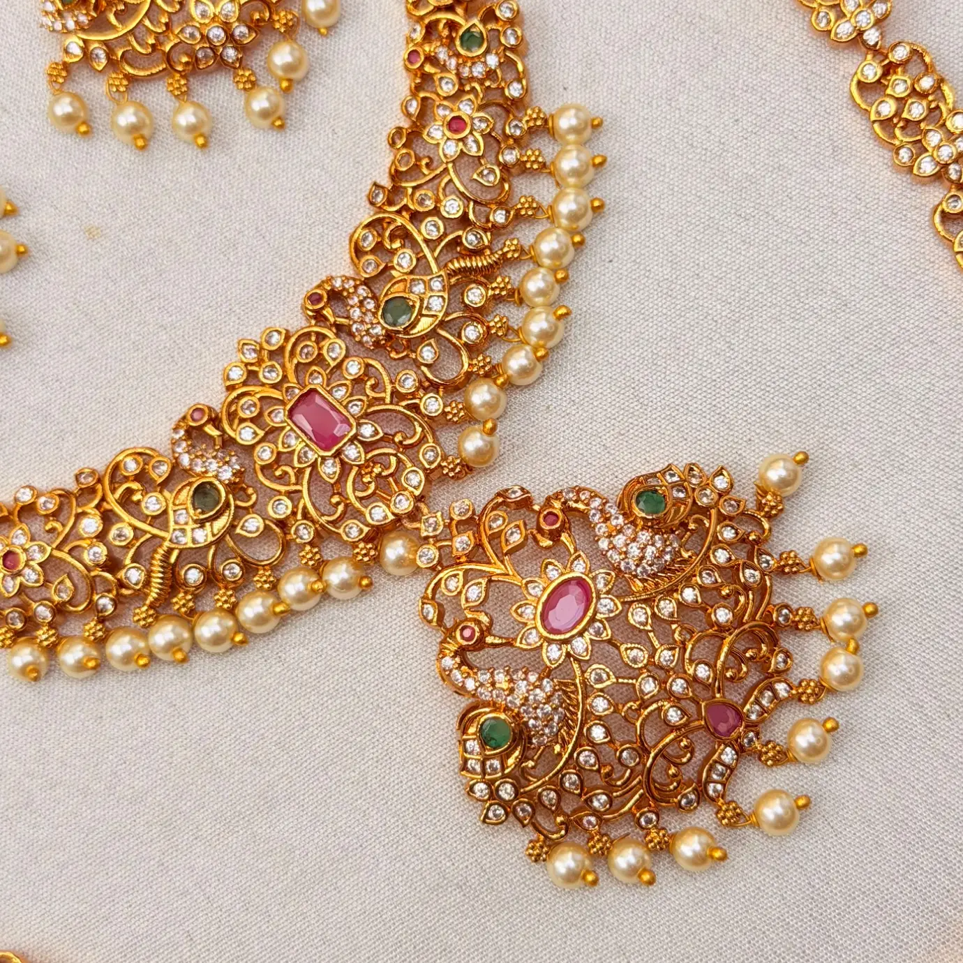 Gold Replica Matte Antique Mayuri (Peacock) Bridal Combo – Short & Long Neckpiece, Matching Jhumka/Drop Earrings & Maang Tikka with Ruby-Emerald Kemp Stones & Pearl Drops SJAD044
