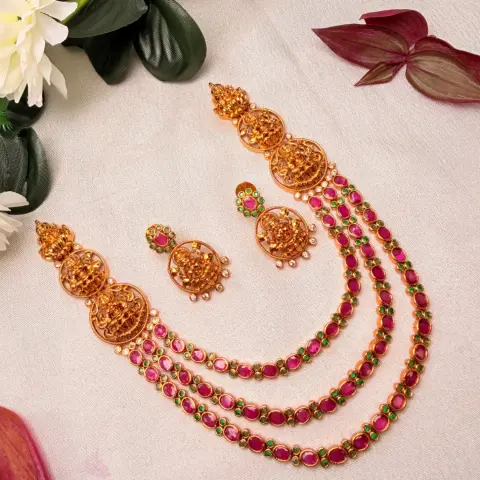 Multi-Strand Ruby Kemp & Emerald Stone Step Haram with Goddess Lakshmi Side Medallions & Matching Stud Earrings SJAD049