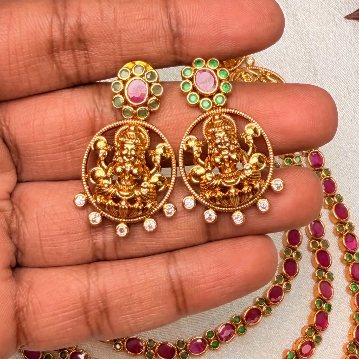 Multi-Strand Ruby Kemp & Emerald Stone Step Haram with Goddess Lakshmi Side Medallions & Matching Stud Earrings SJAD049