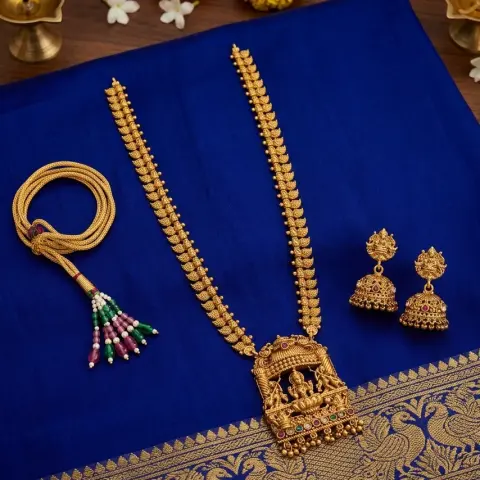 Gold Replica Antique Matte Manga Mala (Mango Haram) with Architectural Temple Mantap Pendant featuring Seated Lakshmi & Veena Musicians, paired with Temple Jhumkas