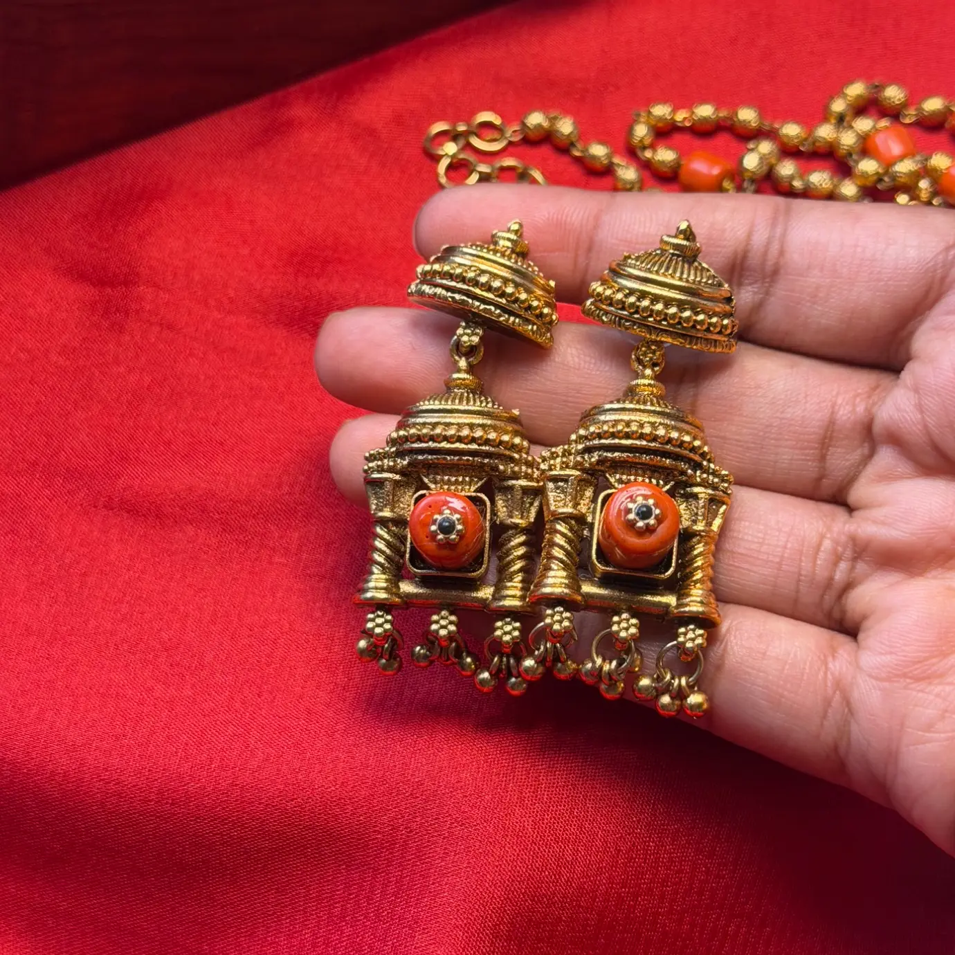 Temple Architecture Mandap Neckpiece with Coral and Polki Diamond Simulant Settings, Beaded Long Chain, and Matching Jhumka Earrings