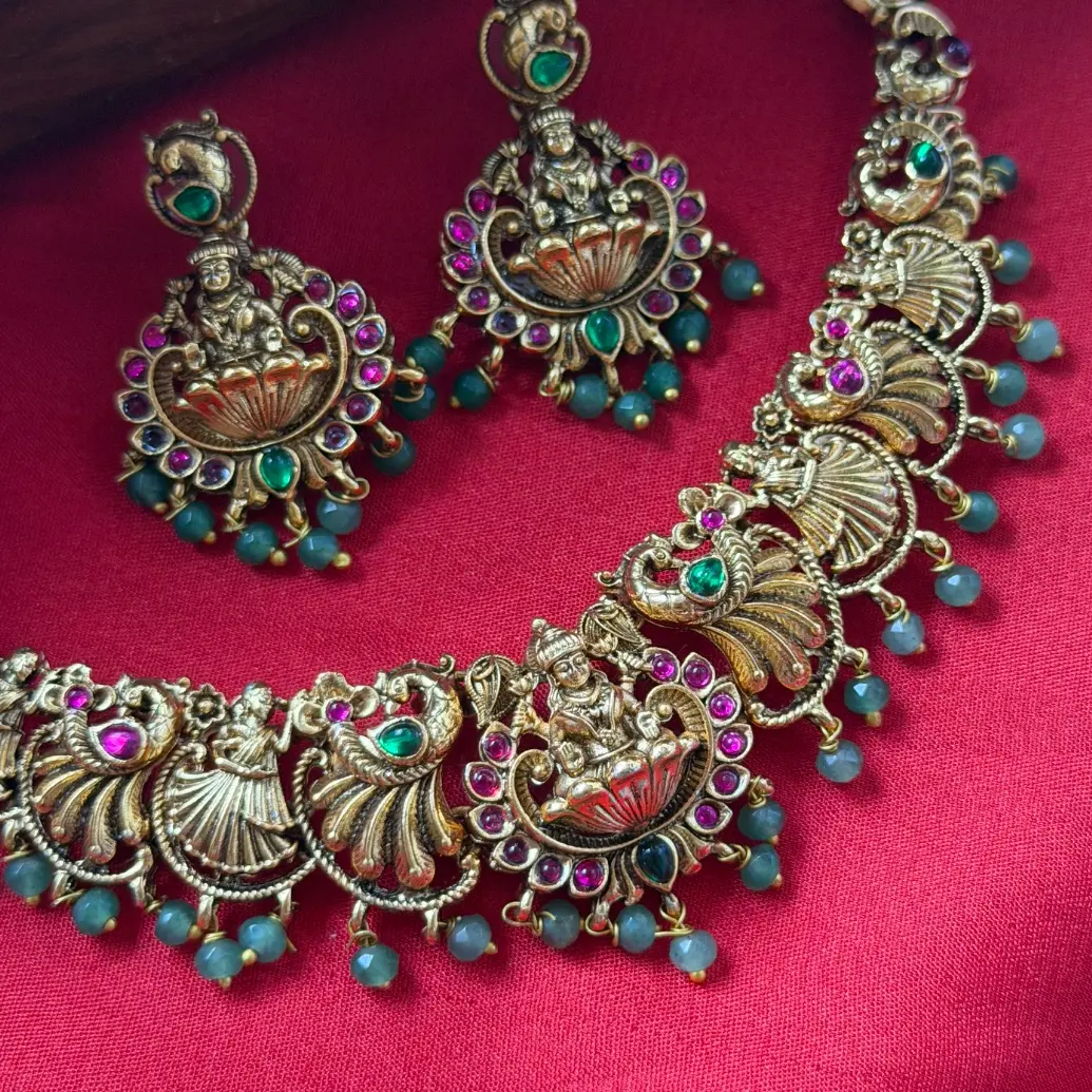 Gold Replica Antique Matte Seated Lotus Lakshmi & Mayuri (Peacock) Fan Nakshi Necklace with Ruby-Emerald Kemp Cabochons & Mint Green Bead Clusters