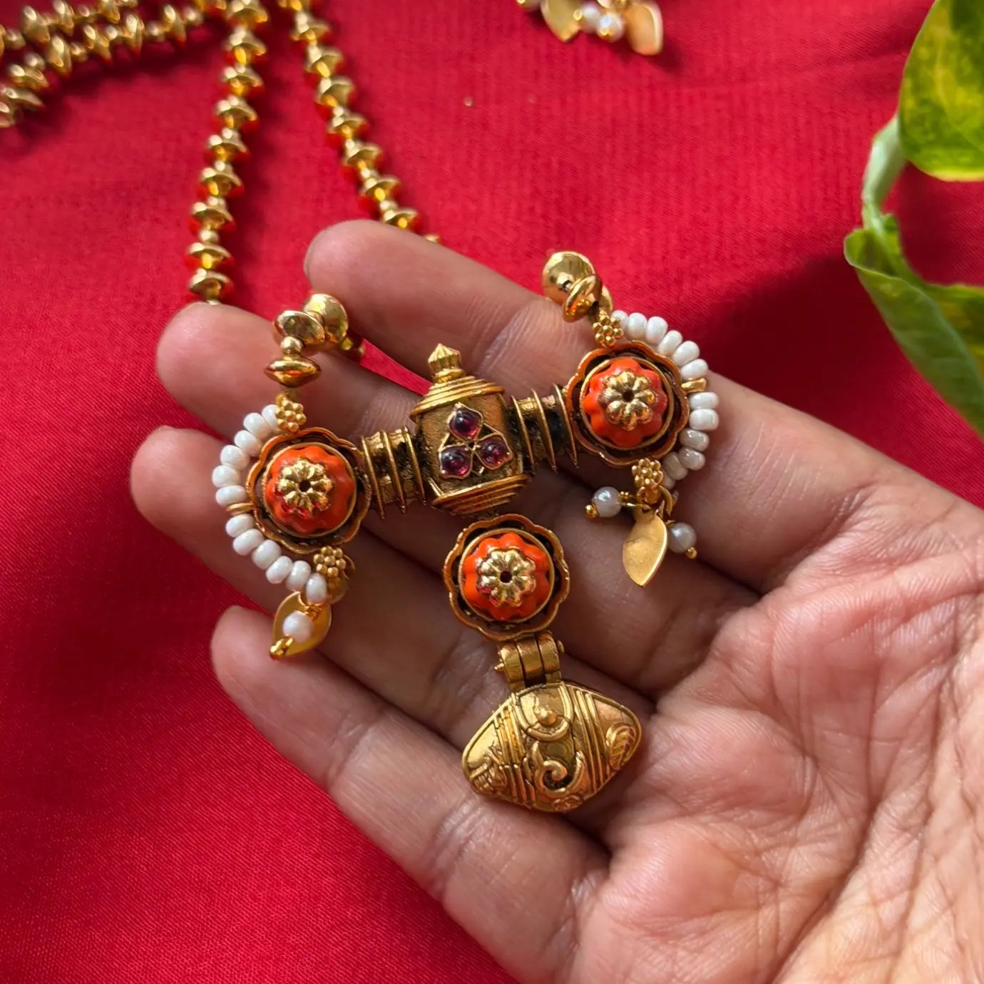 Gold Replica Antique Matte Beaded Long Chain Mala with Architectural Coral-Ruby Floral Pendant & Matching Pearl-Accented Drop Earrings