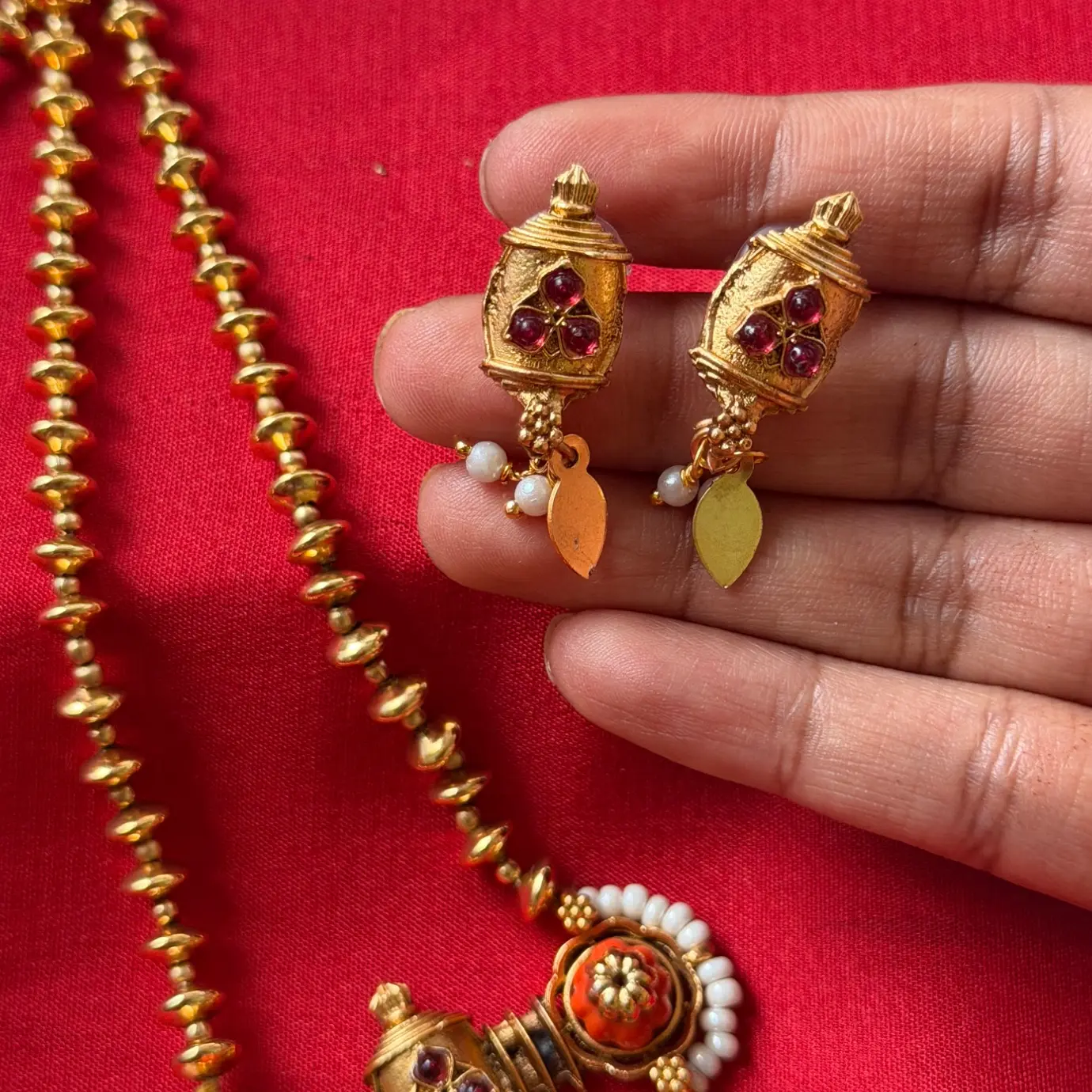 Gold Replica Antique Matte Beaded Long Chain Mala with Architectural Coral-Ruby Floral Pendant & Matching Pearl-Accented Drop Earrings