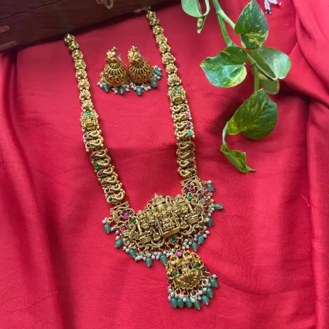 Temple Nakshi Long Haram Set – Seated Goddess Lakshmi & Govinda Shrine Pendant, Green Bead Drops & Matching Jhumka Earrings