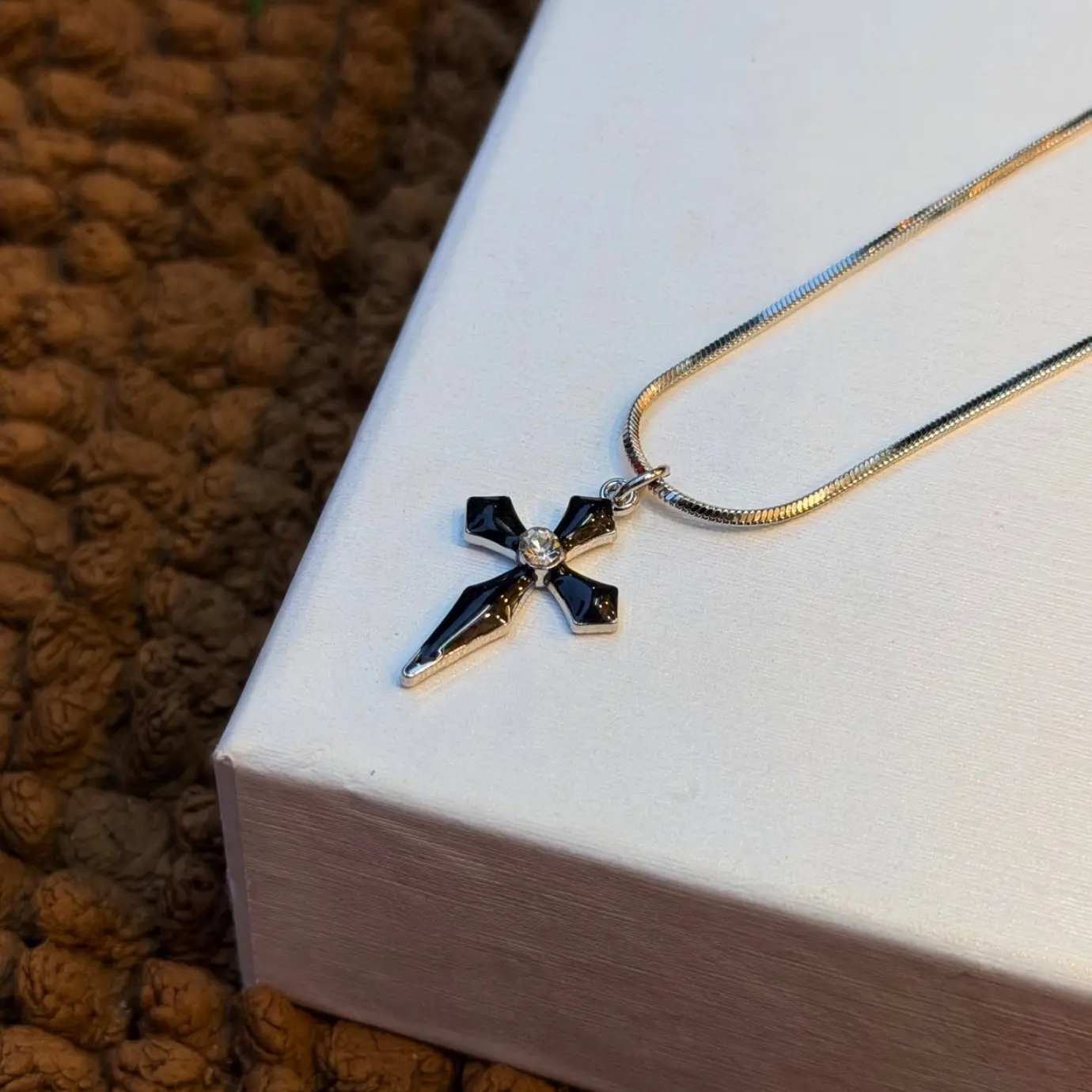 BLACK STONED CROSS