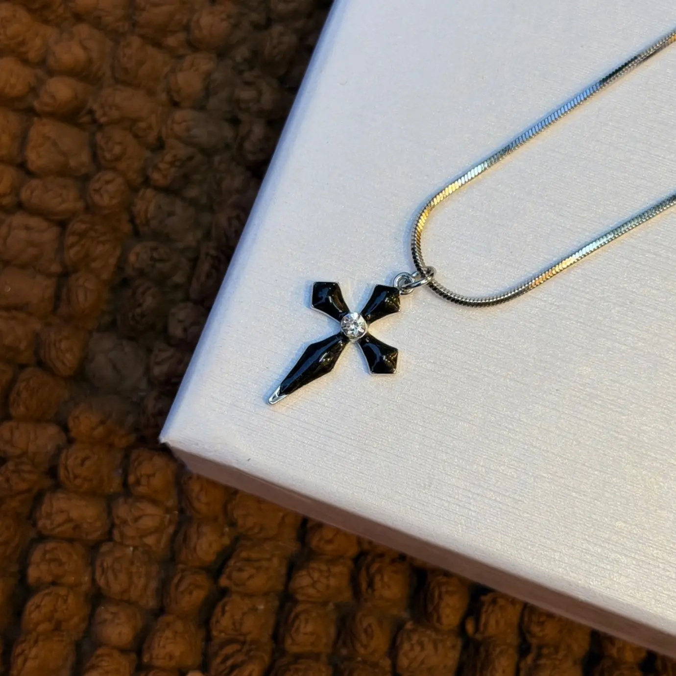 BLACK STONED CROSS
