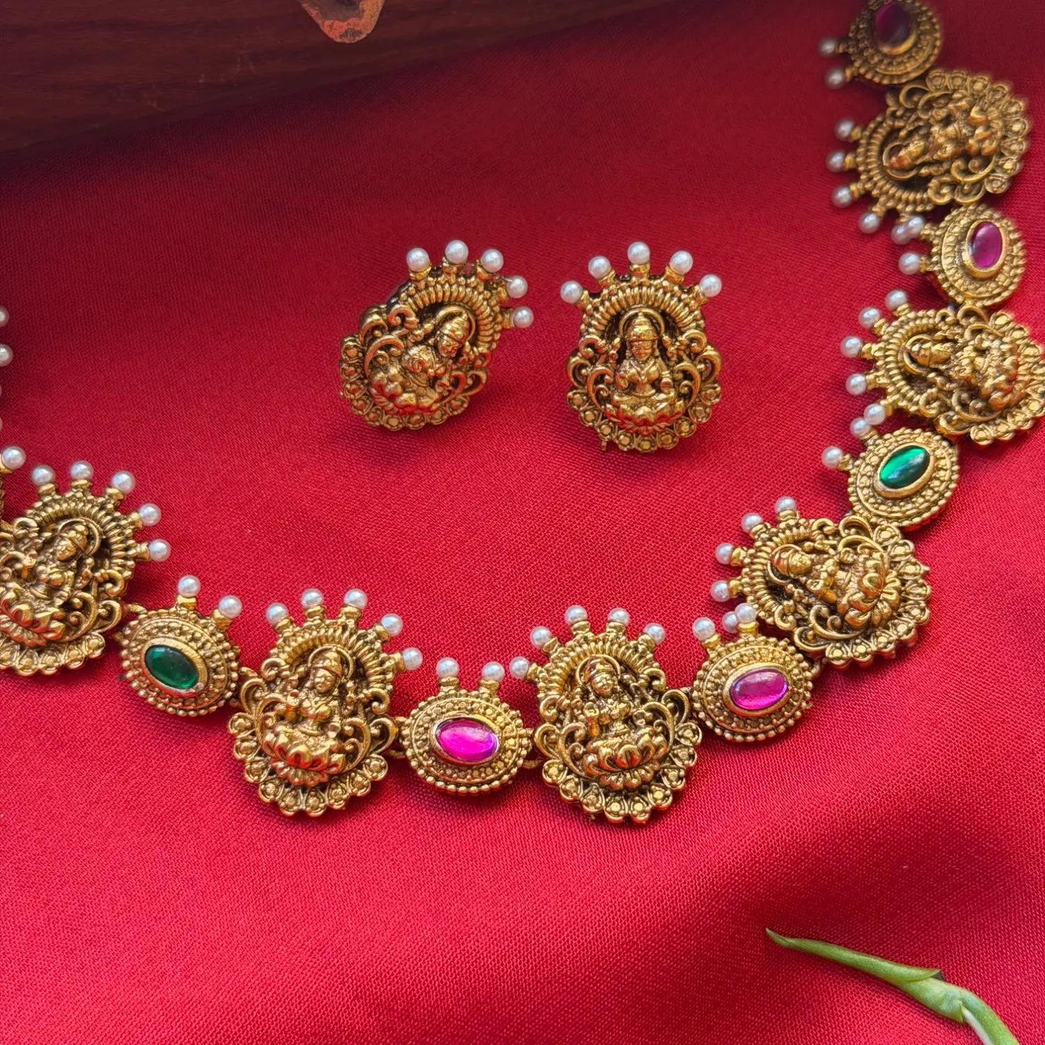 Gold Replica Antique Temple Seated Goddess Lakshmi Medallion Necklace Set – Pearl Crest Trim, Alternating Ruby & Emerald Kemp Stones & Matching Lakshmi Studs