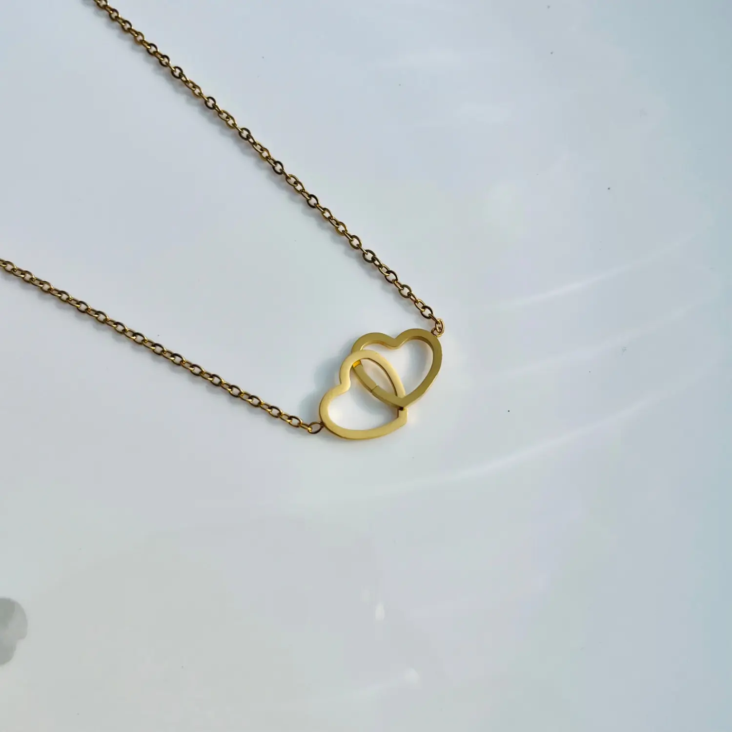 Interlinked heart neck chain