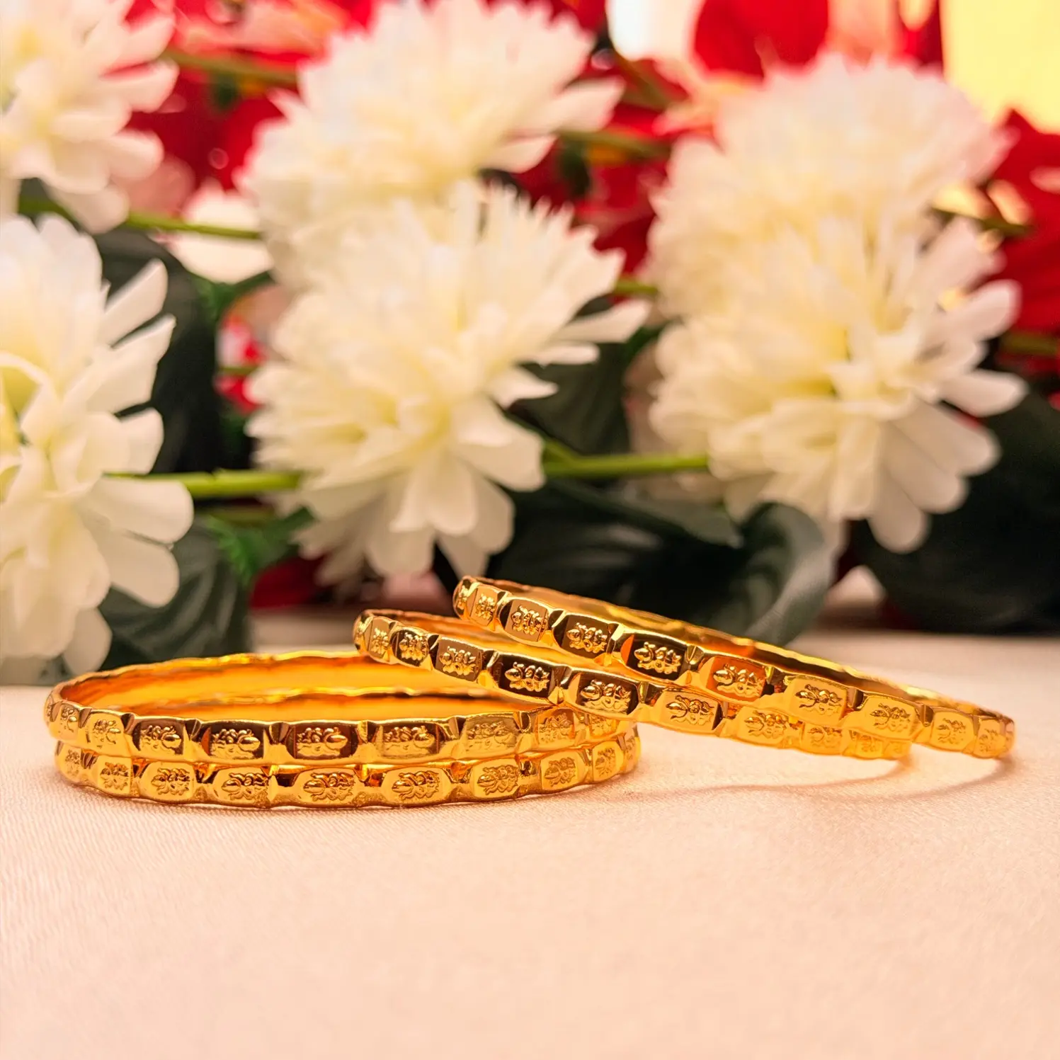 Intricate Floral Carved Gold-Plated Bangles