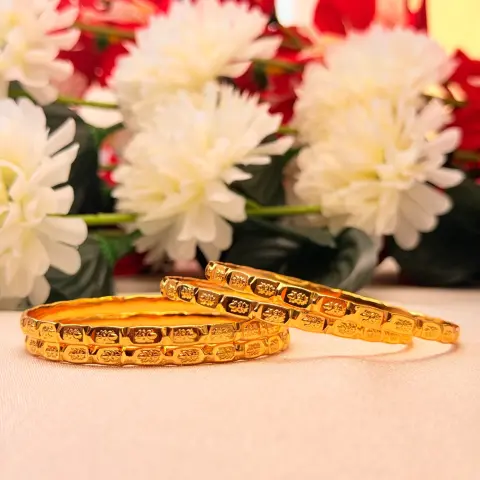 Intricate Floral Carved Gold-Plated Bangles