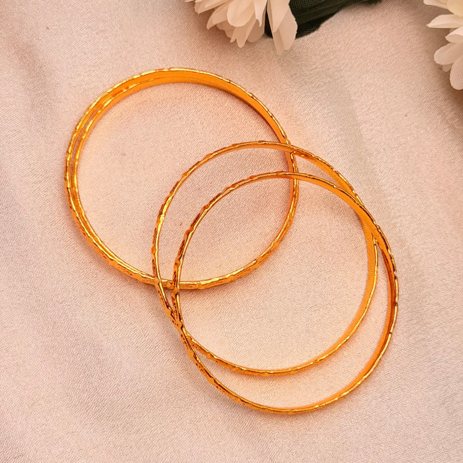 Intricate Floral Carved Gold-Plated Bangles